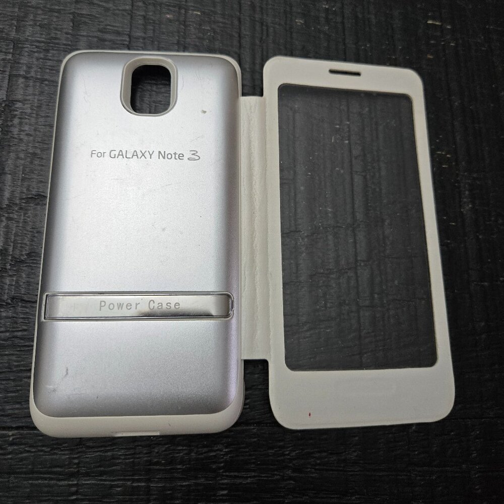 Charger and protective case for a Samsung Galaxy Note 3. Used.